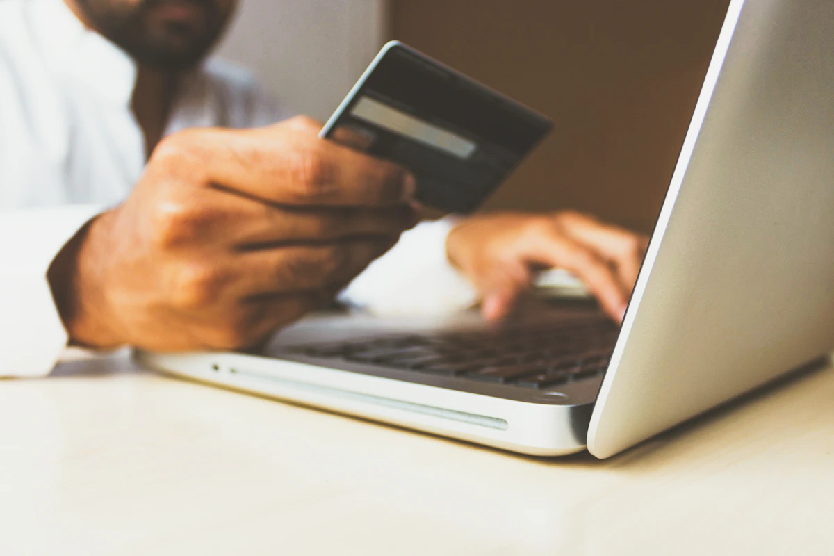 Individual filing their Canadian tax return online using a laptop, reviewing TurboTax Canada 2026 options